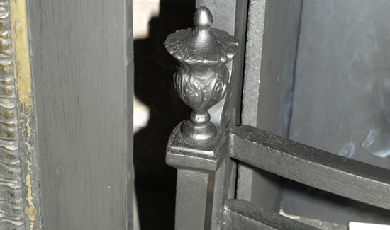 _3095952 Intricate hand-cast dog irons. Bespoke Fireplaces