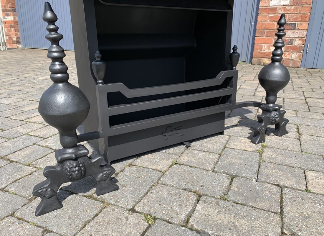 Thermovent with large Bespoke Dog Irons Bespoke fireplace with three bar gate front, and bespoke large dog irons