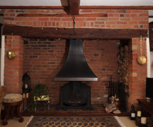 PC110874 Inglenook canopy Inglenook canopy and intricate heavy fire grate.