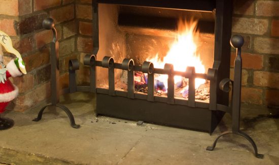 PC304062a Fire grate front and dog irons Feature Fireplaces